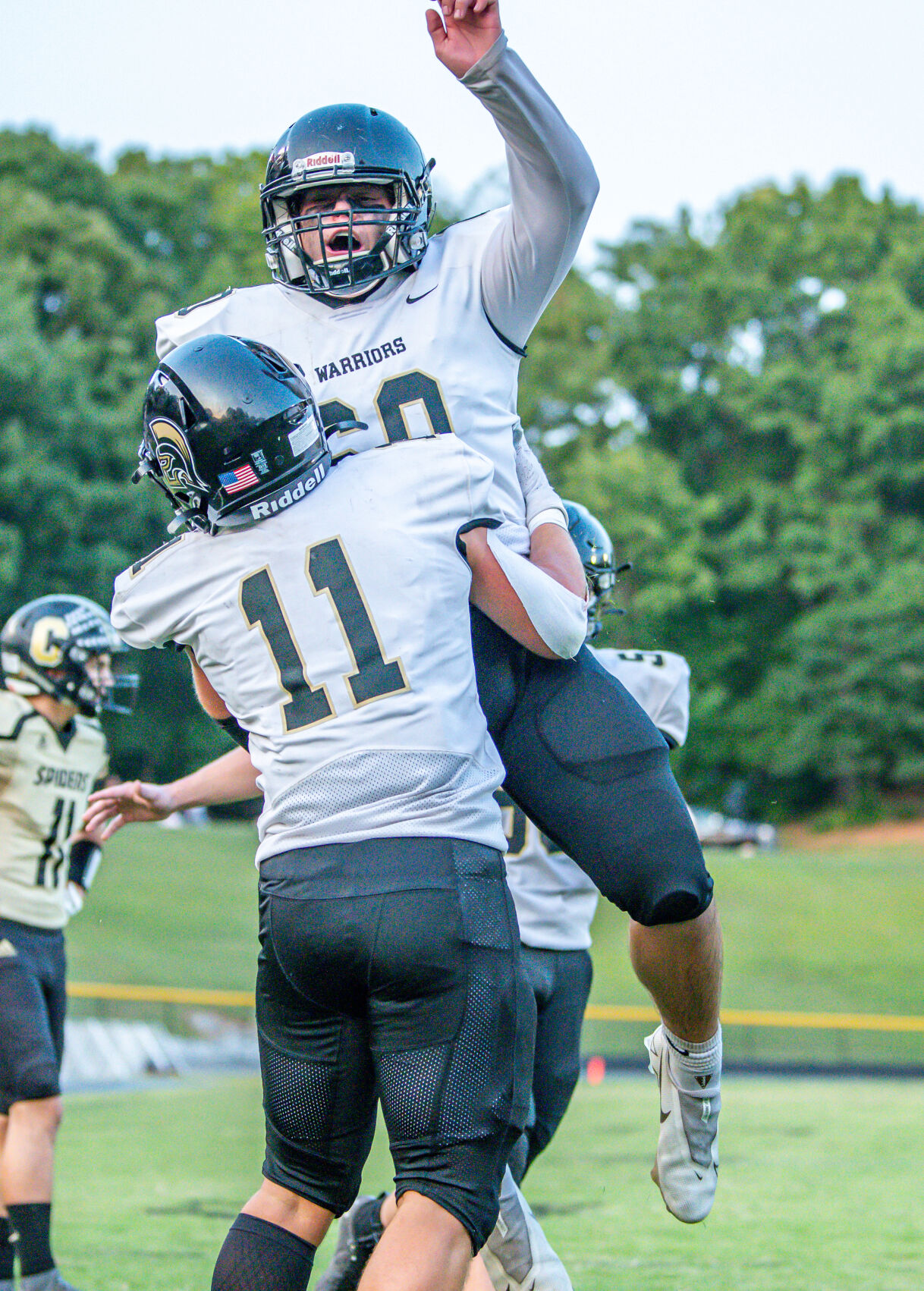 The Warriors dominated the Spiders 49-21.